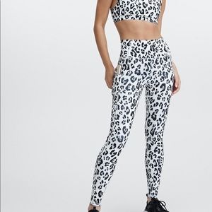 Fabletics Lola Low Impact Sports Bra & Oasis High-Waisted Legging | Snow Leopard